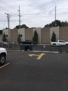 A custom cantilever gate with access control equipment and a gate operator